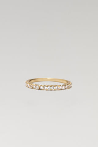 Livia ring, gold plated, front view of the slim band with a line of clear cubic zirconia