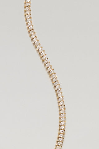 Nico tennis bracelet, gold plated, close-up of the angled marquise-cut cubic zirconia in claw settings