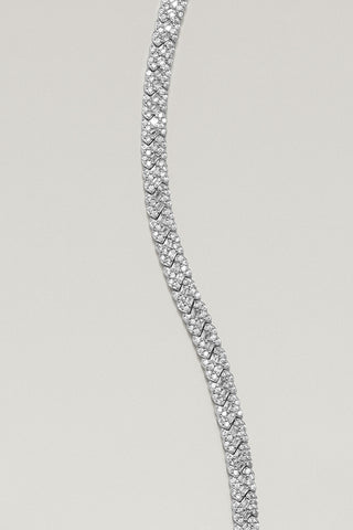 Roxy tennis bracelet, silver plated, close-up of the interlocking X settings and baguette cubic zirconia