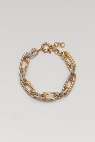 Allegra bracelet, gold and rhodium plated, lying in a circle with its spring-ring clasp and extender