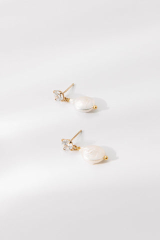Detail view of Amelie earrings with crystal stud and pearl drop