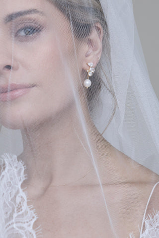 Editorial bridal styling showcasing Belle earrings from the Louise Cooney collection