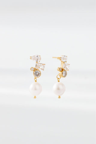 Front view of Belle earrings featuring crystal stones and pearl drop
