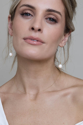 Camille earrings styled as part of the Louise Cooney bridal collection