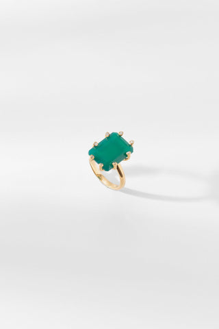 Front view of Donatella Ring featuring emerald green stone in gold