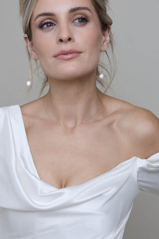 Minimal bridal look styled with the Elodie necklace