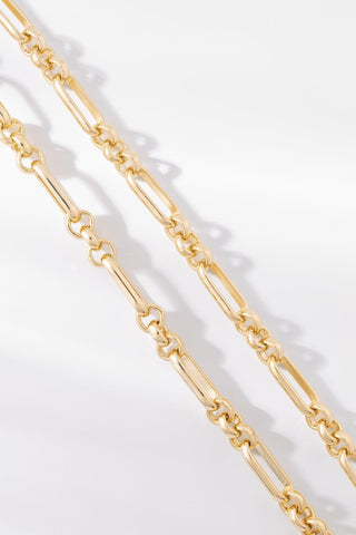 Close-up of Jamie bracelet highlighting elongated gold chain links