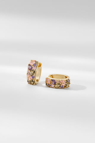 Jude gemstone huggie earrings featuring multi-colour stones set in gold on a white background