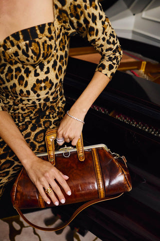 Round Tennis Bracelet worn on wrist, an elegant gold tennis bracelet designed for everyday luxury wear.